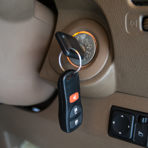 Expert hands working on a car's ignition system with Car Key Pros Ignition Locksmith Service