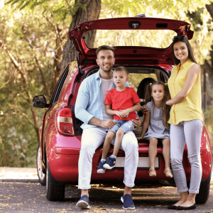 Happy Family Sitting in Car Trunk, after the service of trunk lockouts locksmith service in Austin TX