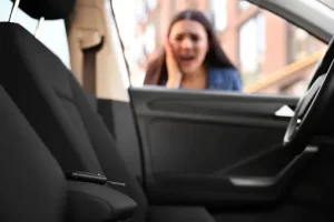 Woman calling locksmith in Serenada TX after locking keys in car.