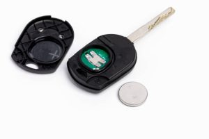 Replacement key fob being programmed by professional locksmith in Austin TX